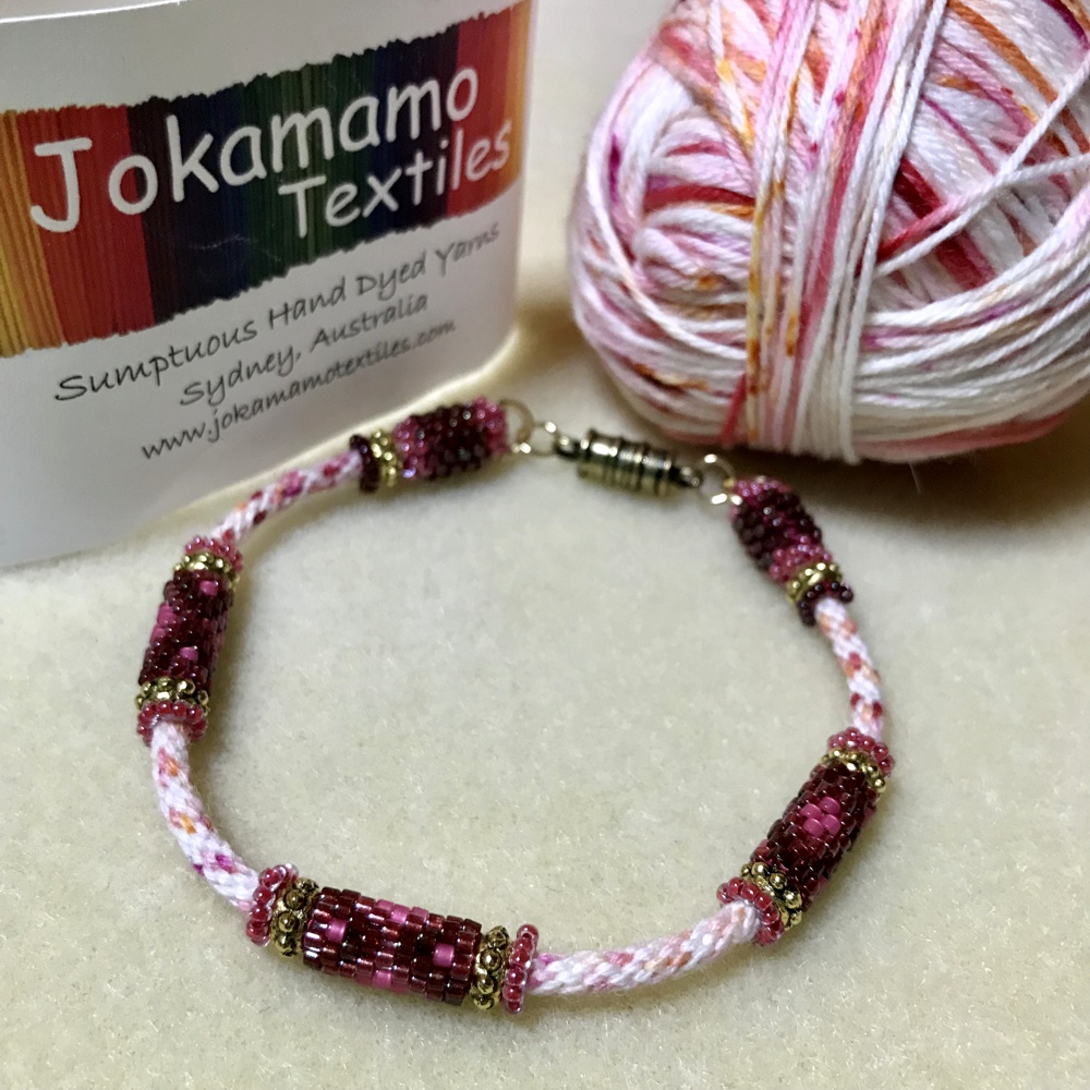 Jokamamo Textiles Fingering sock - Raspberry Sherbet